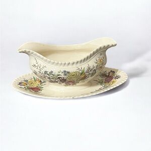 Johnson Bros Windsor Ware Garden Bouquet Gravy Boat with attached saucer.